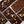 Noir Dream dark chocolate bar with geometric pattern and gold flakes